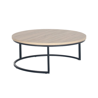 Nevada Round Nesting Coffee Table Set in Natural features a low, round oak-toned tabletop with a sleek black metal frame. The semi-circular leg design provides modern, space-saving functionality ideal for stylish living spaces.