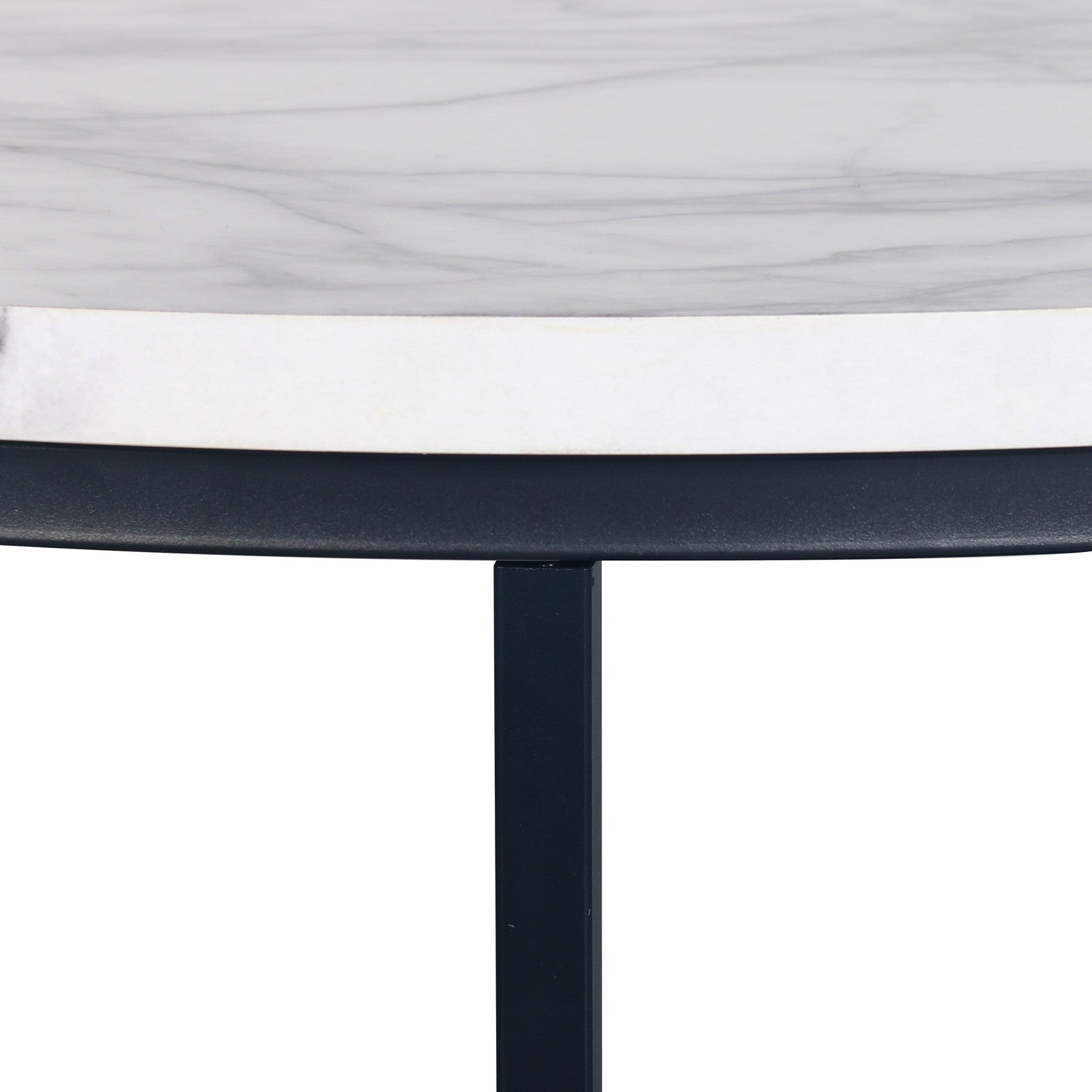 Close-up of the Nevada Round Nesting Coffee Table Set in White Marble, featuring a white tabletop with light gray veins, supported by a slim black metal frame with visible square metal legs.