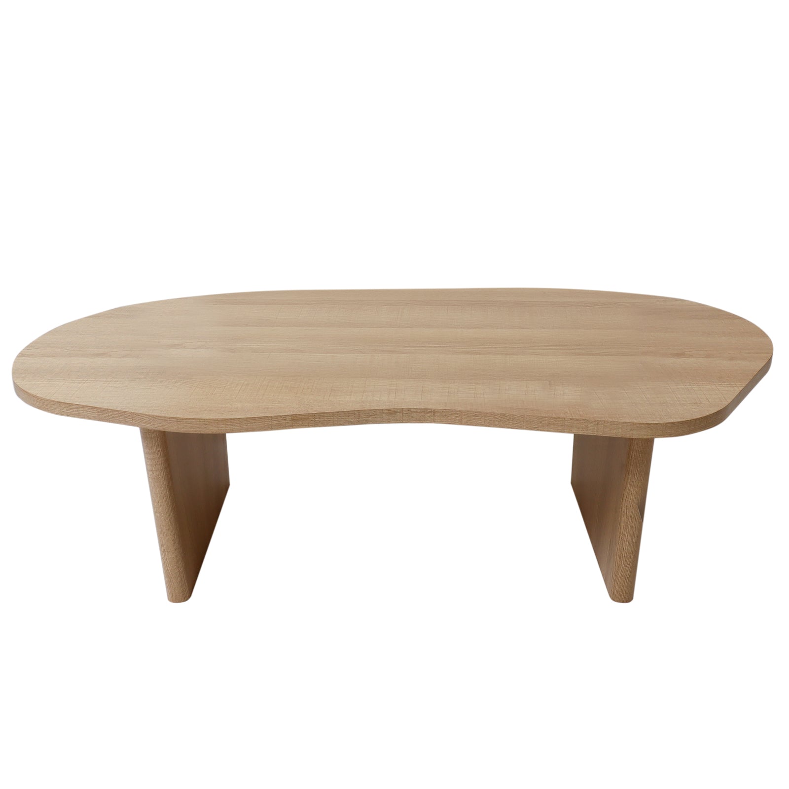 Nicole 120cm Oval Coffee Table in Natural featuring a light-oak finish with an organic-shaped top and flat panel legs, offering a modern, minimalist design for contemporary Australian living spaces.
