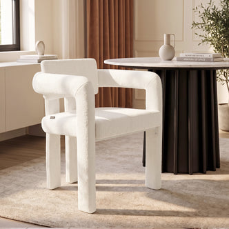 White upholstered chair in a modern styled room