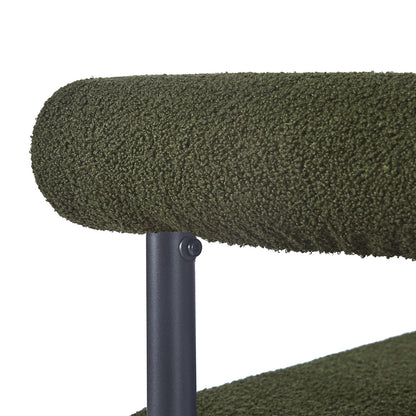 Close-up of Ohio Curved Bouclé Dining Chair Set of 2 in Green, showcasing the tubular, green loop-textured cushion on a sleek black metal frame, highlighting its modern, stylish design.
