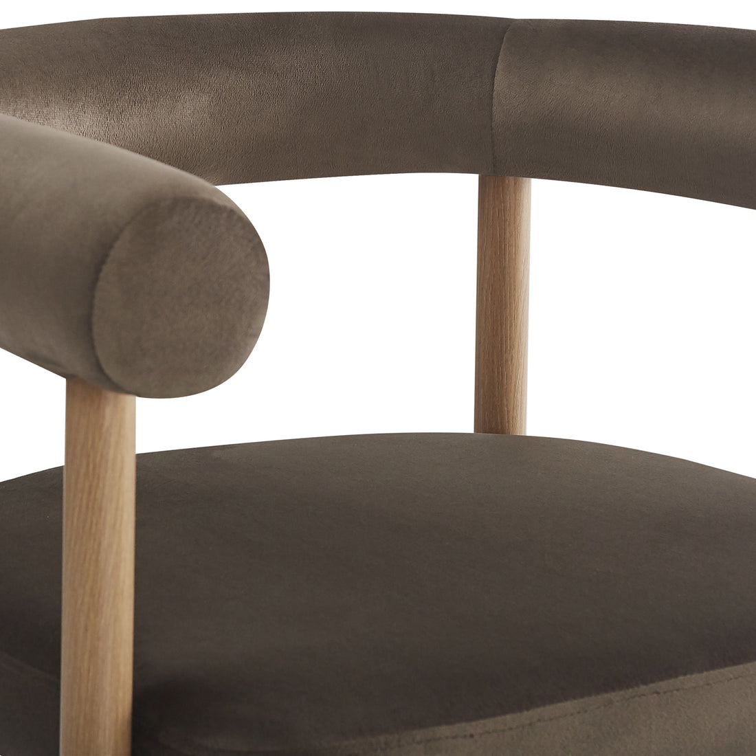Close-up of the Ohio Velvet Dining Chair w/ Natural Legs Espresso Brown Set of 2, featuring a round, padded seat and curved tubular backrest, upholstered in plush velvet, supported by oak-finish slender wooden supports.