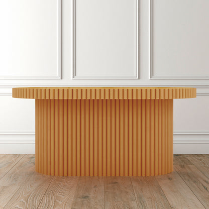 Olive Natural Rattan Side Coffee Table - Honey, oval-shaped with a tempered glass top, showcasing natural rattan texture, placed elegantly in a room, emphasizing its compact and versatile design.