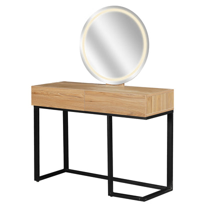 Ophira Dressing Table with Touch Screen Mirror in Light Oak features a light-wood tabletop with two drawers on a black metal base, complemented by a round LED-lit mirror for versatile lighting.