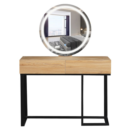 Ophira Dressing Table with Touch Screen Mirror in Light Oak features a light wood-grain top, two drawers, and a large round LED-lit mirror set in a sleek black metal frame.