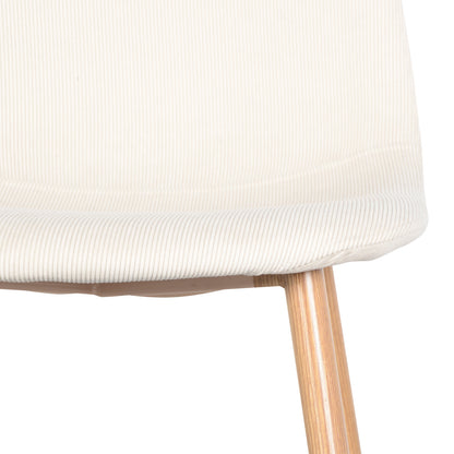 Close-up of a plush corduroy chair from the Oregon Table with 8 Florida Corduroy Chairs Dining Set Beige, highlighting its sleek design and luxurious texture, part of a contemporary dining arrangement.