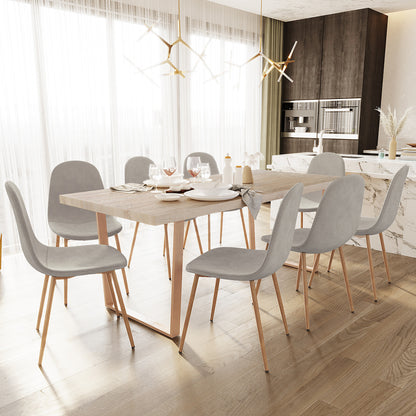 Oregon & Florida 8 Seater Dining Table & Chair Set in Grey features a light-wood table, grey upholstered chairs, and gold-tone pendant lights, set in a bright dining area with sheer curtains.