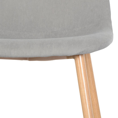 Close-up of a Florida Corduroy Chair from the Oregon & Florida 8 Seater Dining Table & Chair Set in Grey, showcasing the light gray corduroy seat and tapered light-wood leg.