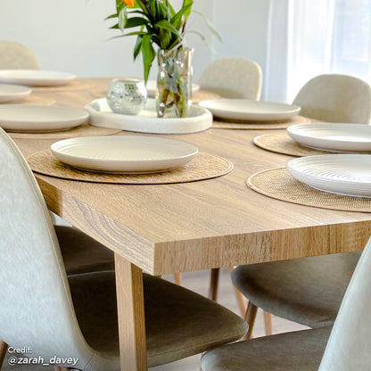 Oregon 200cm Industrial Dining Table - Natural, featuring a light-wood finish, set with neutral-tone plates, woven placemats, and a centerpiece tray with foliage, exemplifying a modern, minimalist dining setup.