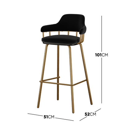 Piper Velvet Fabric Bar Stool Set of 2 in Black features a mid-century design with a low curved backrest, padded black upholstery, and warm brass metal legs with a built-in footrest.