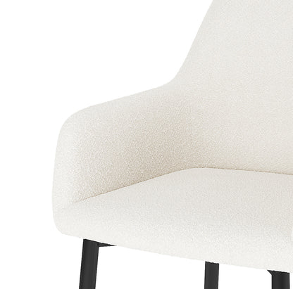 Raynie Boucle Dining Chair Set of 2 in Cream White, featuring a textured bouclé fabric, gently curved seat, and backrest, supported by slim black metal legs, offering a modern and stylish dining upgrade.