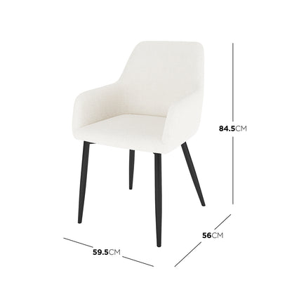 Raynie Boucle Dining Chair Set of 2 in Cream White, featuring a modern upholstered design with softly contoured seat and low armrests, supported by splayed black legs; dimensions visible as 84.5x59.5x56 cm.
