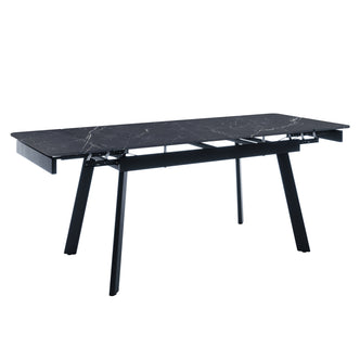 Rheed 197cm Extendable Ceramic Dining Table in Black, featuring a sleek faux-marble tabletop with sliding extension leaves, supported by a sturdy black metal frame with outward-angled legs.