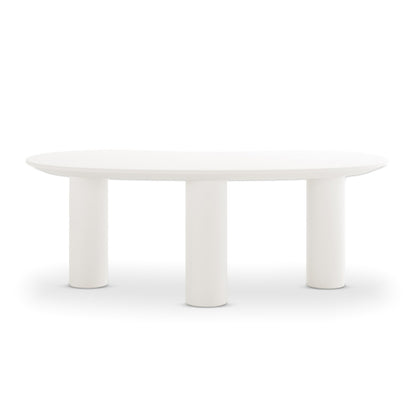 Sallie Cashew Coffee Table with Pillar Legs in White, featuring an oval top on three cylindrical legs, exudes modern elegance and minimalist design, ideal for enhancing living room or bedroom aesthetics.