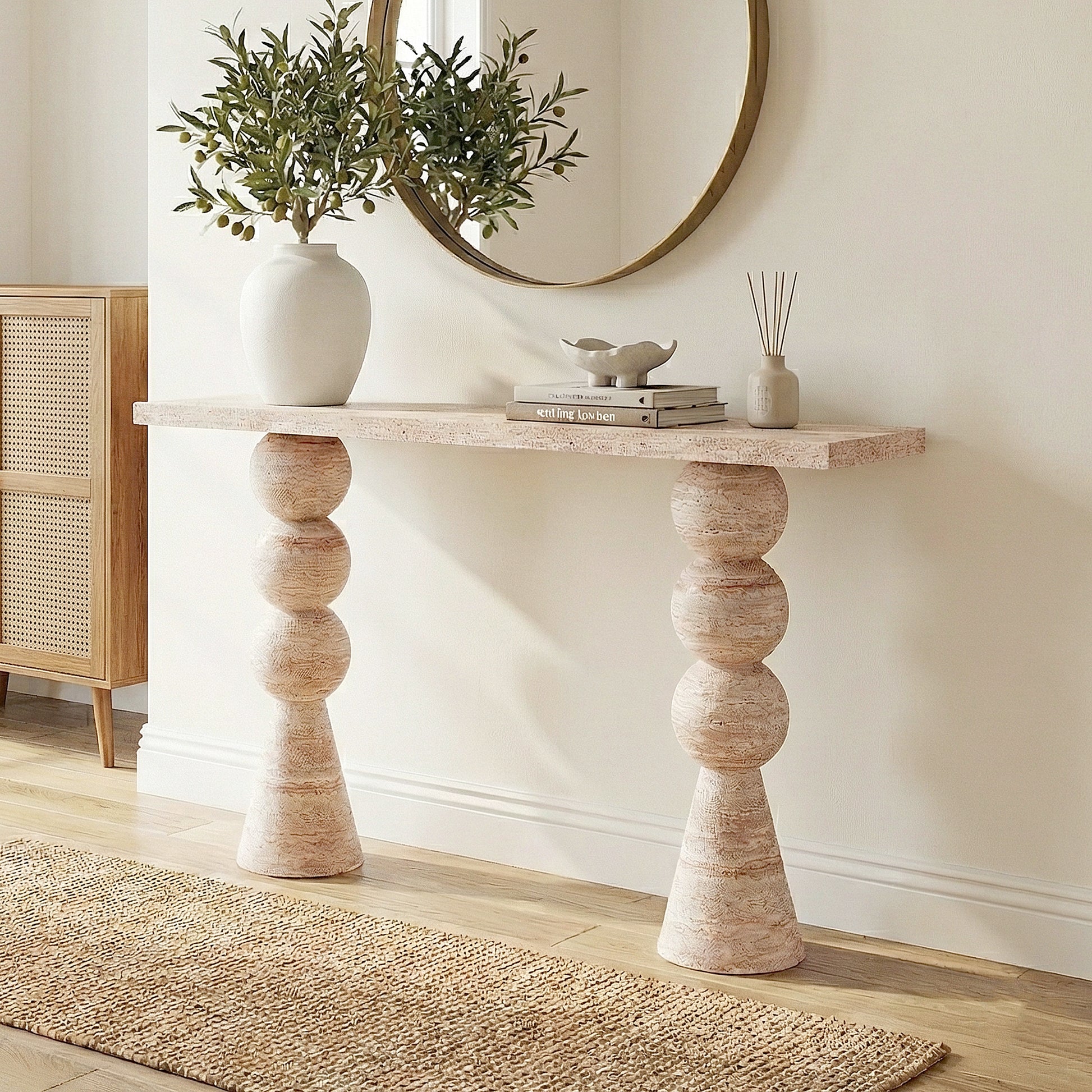 Sandford Modern Concrete Console Table - Travertine features a travertine-like finish with a smooth, rectangular top and a sculpted, round-shaped base, ideal for enhancing narrow spaces like hallways.