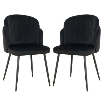 Scarlett Velvet Dining Chair Set of 2 in Black, featuring elegantly curved upholstered seats with subtle vertical channel stitching and slender tapered black metal legs for a modern touch.