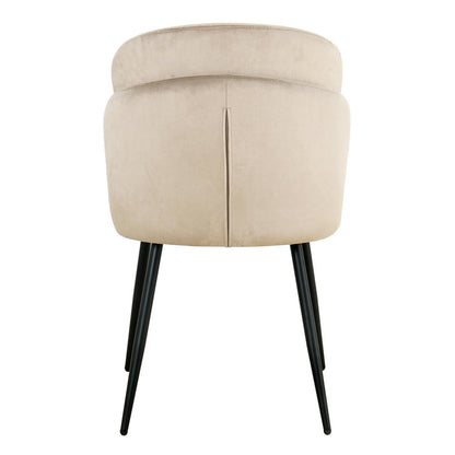 Scarlett Velvet Dining Chair Set of 2 in Warm Grey, showcasing a gently curved, padded backrest and seat on slender black metal legs, highlighting its sleek and modern design.