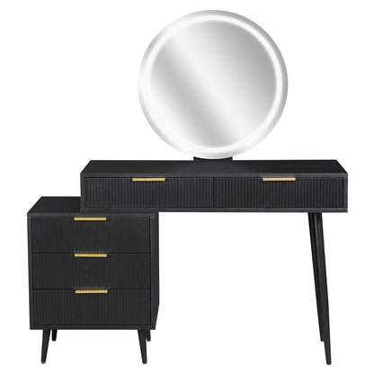 Serenity Makeup Vanity Table with LED Touch Mirror in Black features a grooved three-drawer cabinet and elongated desktop, with an illuminated round mirror and elegant gold-tone accents, offering modern style and functionality.