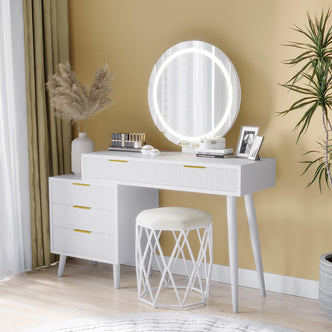 Serenity & Paisley Makeup Vanity Table & Stool Set in White features a white wooden vanity with ribbed drawers, LED mirror, and a matching stool with a geometric base, surrounded by cosmetics and decor.