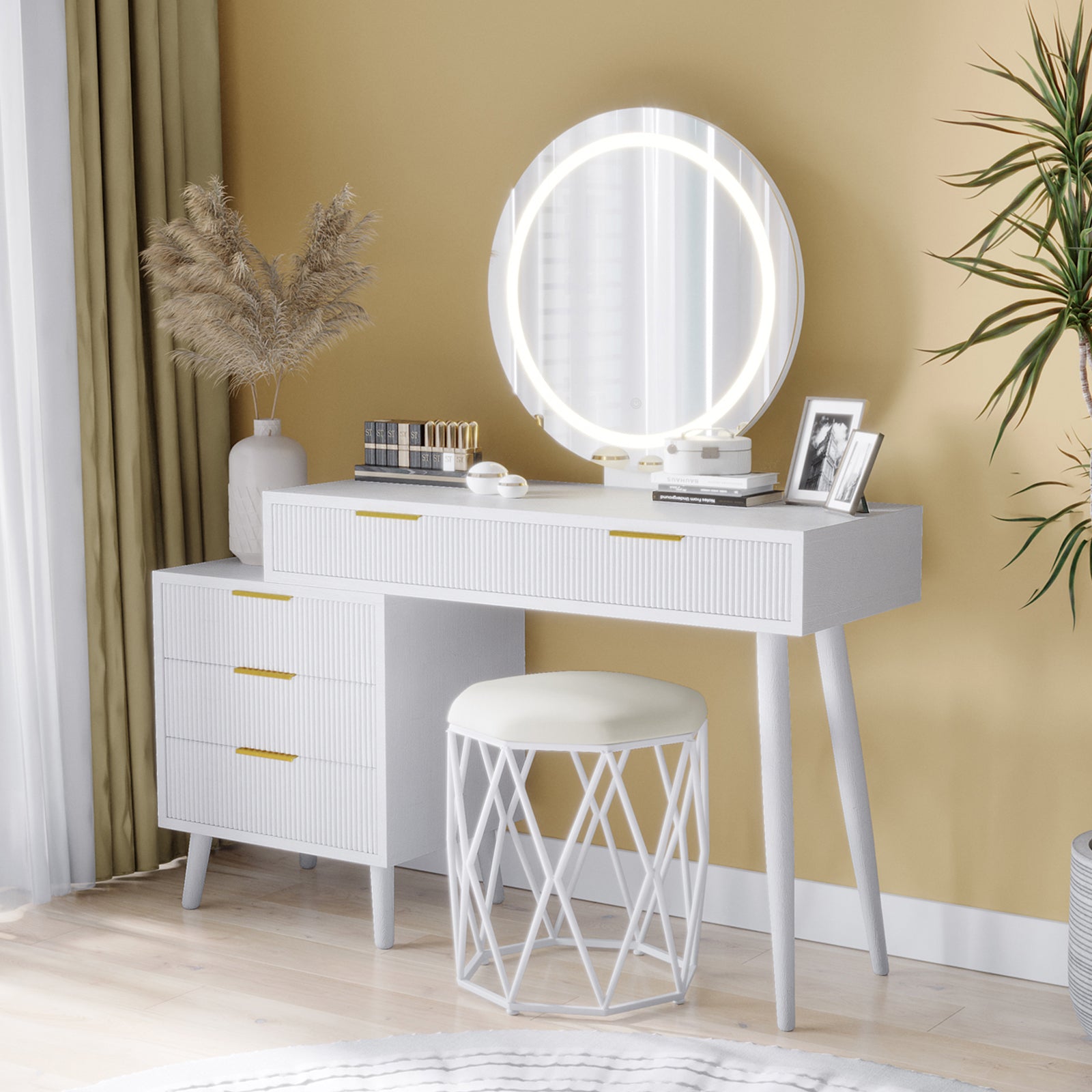 Serenity Makeup Vanity Table with LED Touch Mirror in White features a sleek design with three gold-handled drawers, illuminated mirror, and complementing stool, creating an elegant and functional vanity setup.