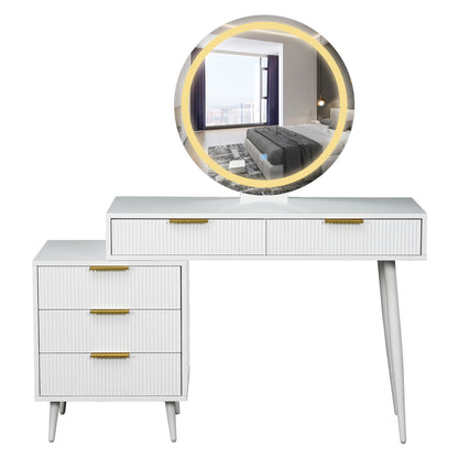 Serenity Makeup Vanity Table with LED Touch Mirror in White features a round back-lit mirror, gold-tone handles on fluted drawers, and sleek metal legs, blending functionality with elegance.