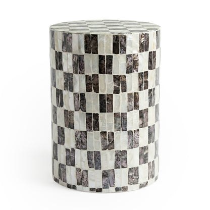 Checkered mosaic cylindrical side table against white background