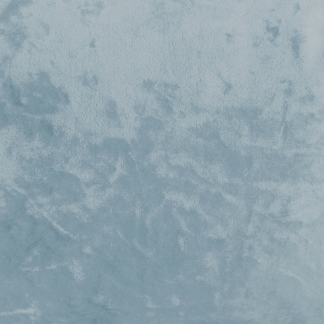 Close-up of Stacey Tassled Velvet Ottoman Foot Stool in Blue, showcasing the plush, light-blue velvet texture with a gentle sheen, highlighting its intricate fringe tassel detailing and luxurious fabric.