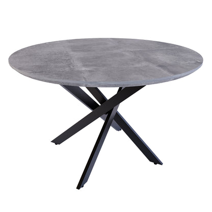 Stoten Round Dining Table Concrete with a round top and black powder-coated legs, showcasing a modern design. The table comfortably seats four, ideal for versatile dining and functional use.