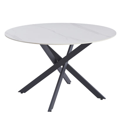 Stoten Round Dining Table White Marble features a sleek, marble-effect tabletop with intersecting black metal legs forming a crisscross base, highlighting a modern, sturdy design for stylish dining spaces.