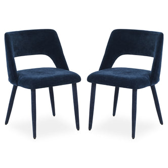 Two dark blue velvet chairs side by side on a white background