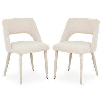 Pair of modern upholstered chairs on white background