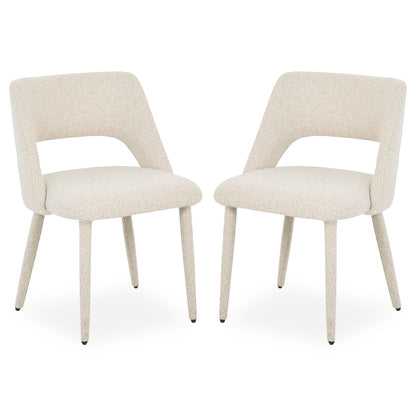 Pair of modern upholstered chairs on white background
