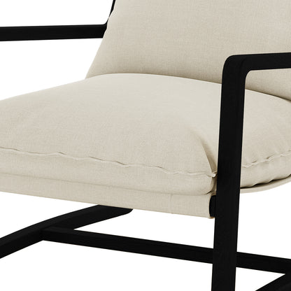 Tilly Linen Hardwood Arm Chair Black, showcasing a close-up of its sturdy oak frame and plush, high-density foam cushions, emphasizing its minimalist design and exceptional comfort in a modern living space.