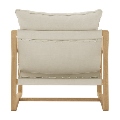 Close-up of the Tilly Linen Hardwood Arm Chair, highlighting its thick white cushion, textured fabric, and sturdy wooden frame, showcasing its minimalist and stylish design for modern living spaces.