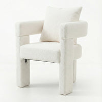 Utah Bouclé Curved 3 Legged Accent Chair in Cream with chunky cylindrical legs, wraparound armrests, and textured bouclé