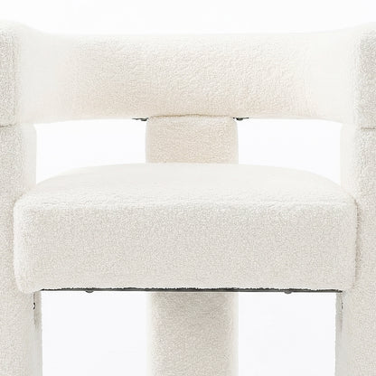 Utah Bouclé Curved 3 Legged Accent Chair in Cream features a close-up of its white boucle upholstery, showing a thick seat cushion and tubular backrest support, highlighting its modern design.