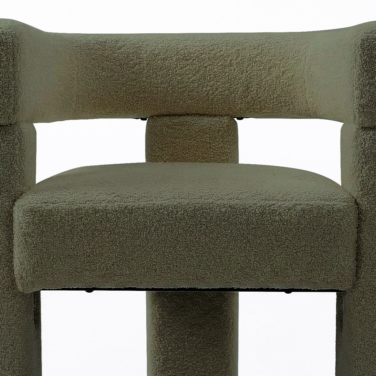 Close-up of the Utah Bouclé Curved 3 Legged Accent Chair in Green, showcasing its textured neutral-tone fabric upholstery, padded seat, and modern cylindrical support legs for stylish and ergonomic comfort.