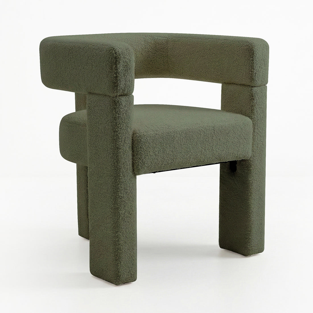 Utah Boucle Curved 3 Legged Accent Chair in Green, featuring a textured olive-green fabric with a chunky, geometric form, flat seat cushion, and continuous U-shaped backrest/armrest design.