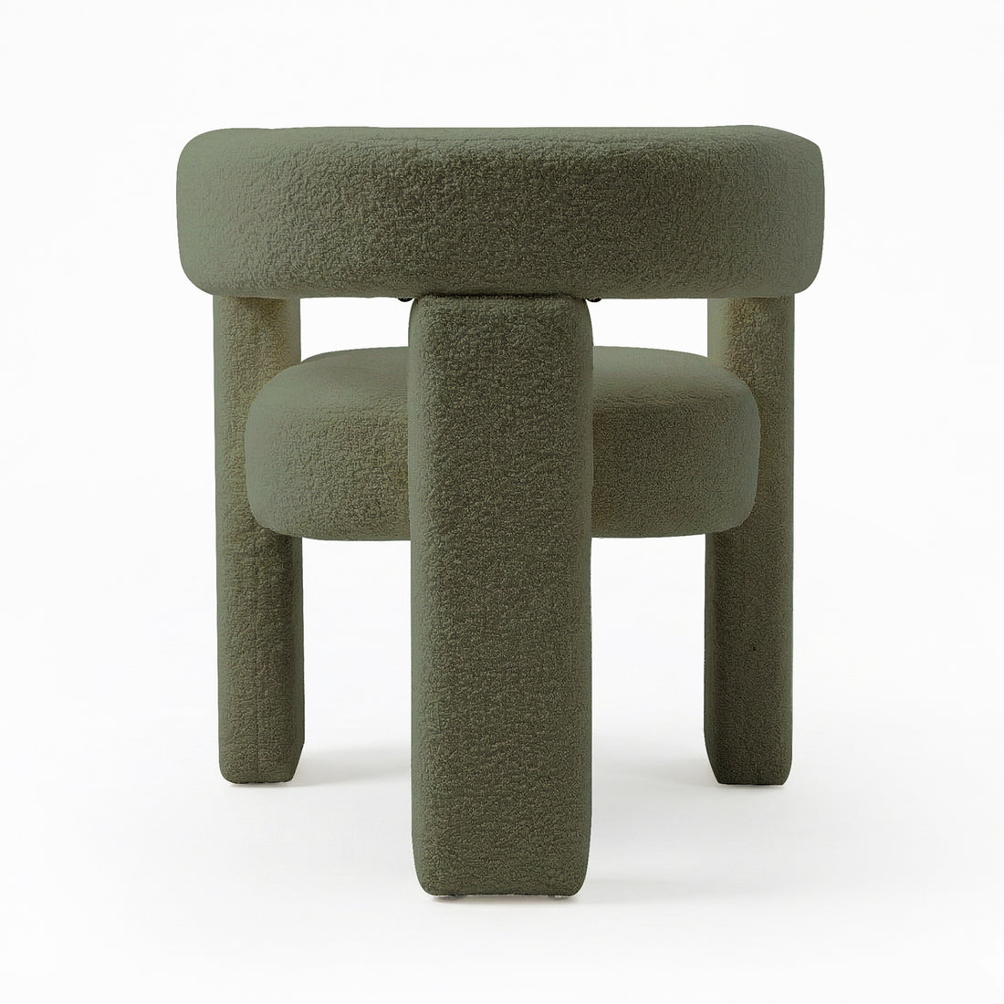 Utah Bouclé Curved 3 Legged Accent Chair in Green, featuring a plush, round cushioned top and four chunky cylindrical legs, all upholstered in muted green bouclé fabric, creating a modern, minimalist look.