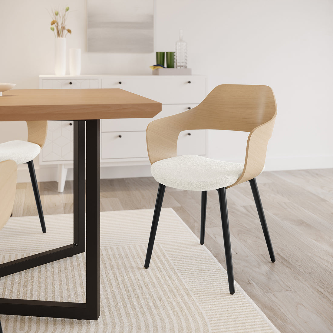 Winfield Curved Wooden Back Boucle Dining Chair Cream White Set of 2, featuring a close-up of the chair's curved wooden back and boucle upholstery, positioned beside a table.