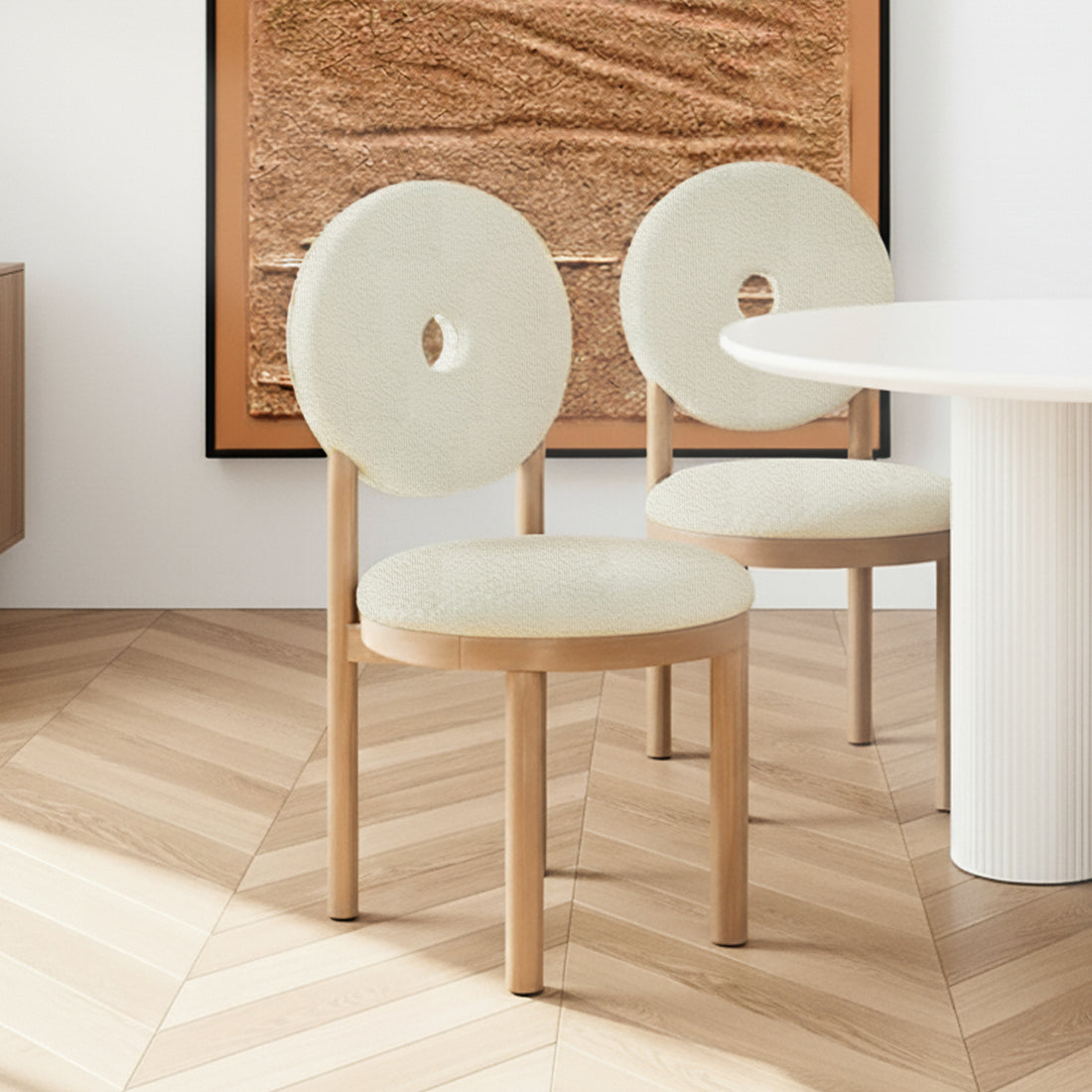 Wubin Boucle Hardwood Dining Chair Set of 2 in Cream White features light wood frames, plush upholstered seats, circular donut backrests, and complements a round table with a fluted base.
