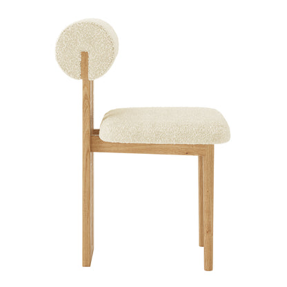 Wylie Boucle Oak Dining Chair Set features plush upholstery and solid oak frame, showcasing exquisite craftsmanship and comfort in a modern design.