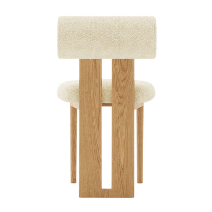 Wylie Boucle Oak Dining Chair Set highlighting plush boucle upholstery, solid oak frame, and elegant wood accents, ideal for adding comfort and style to dining spaces.