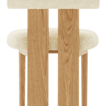 Wylie Boucle Oak Dining Chair Set features close-up views of its wooden frame and plush upholstery, highlighting craftsmanship and comfort.