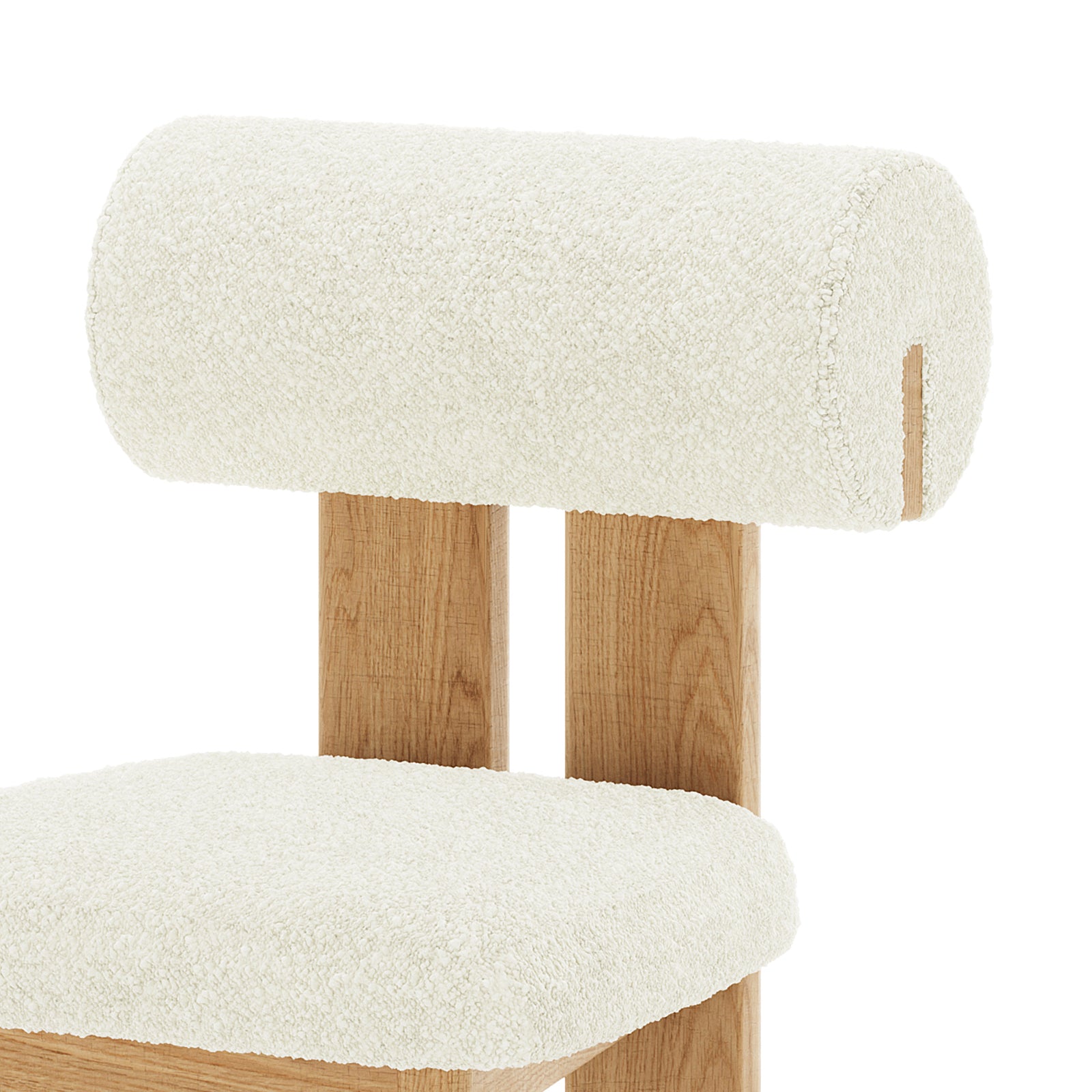 Close-up of Wylie Boucle Oak Dining Chair (Set of Two) showcasing plush boucle fabric upholstery and a solid American oak frame with elegant wood accents, emphasizing comfort and modern design.