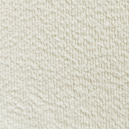 Close-up of Wylie Boucle Oak Dining Chair Set, highlighting plush boucle fabric upholstery with high-density foam padding on seat and backrest, supported by solid American oak frame and oak-paneled legs.