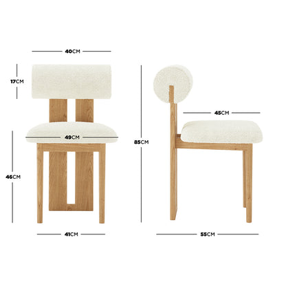 Wylie Boucle Oak Dining Chair Set of Two features plush boucle upholstery, a round seat, solid oak frame, and curved backrest with wooden accents, designed for modern dining spaces.