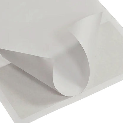 Luxelabel Matte Integrated A4 Label Paper, featuring a partially peeled-off self-adhesive label on a blank sheet, ideal for printing e-commerce packing slips and labels efficiently.
