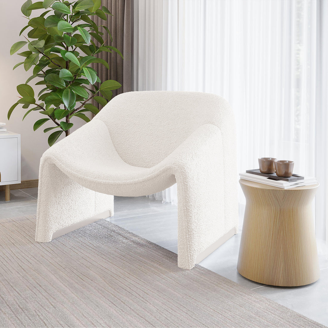 Close-up of the Aaralyn Bouclé Accent Chair featuring soft, textured fabric and a sturdy wood frame, highlighting its plush high-density foam cushioning in a stylish, ergonomic design for comfort and elegance.