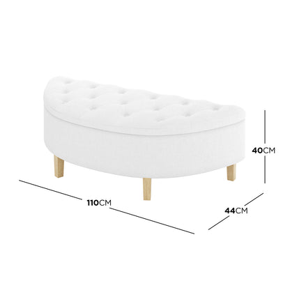Amina Half Round Linen Fabric Ottoman in Off White, featuring a tufted, semi-circular upholstered seat on four short wooden legs, showcasing elegant design and functionality through its soft fabric and sturdy frame.